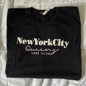 Graphic tee from pretty little thing , size medium, never worn